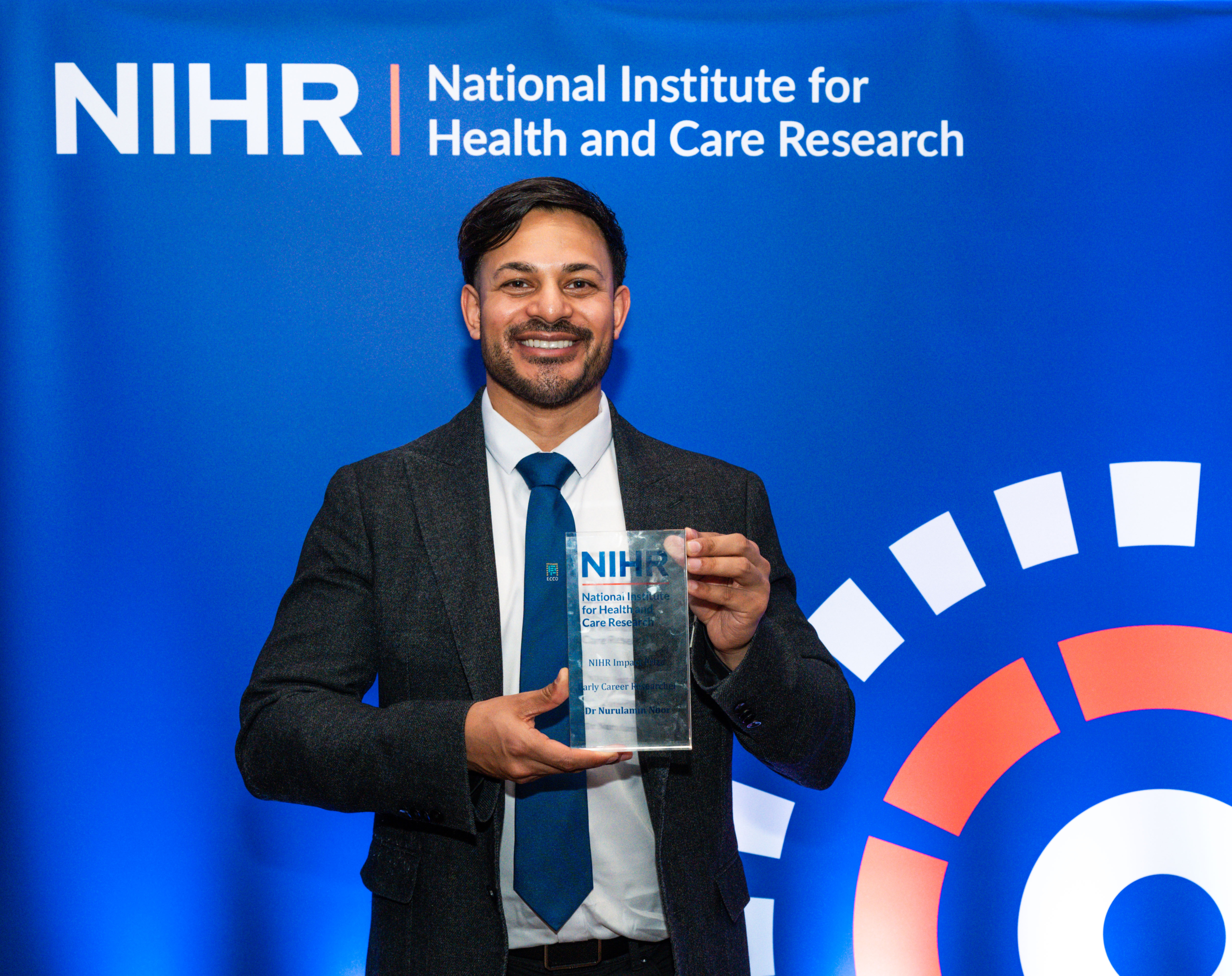 Nuru Noor receiving NIHR award